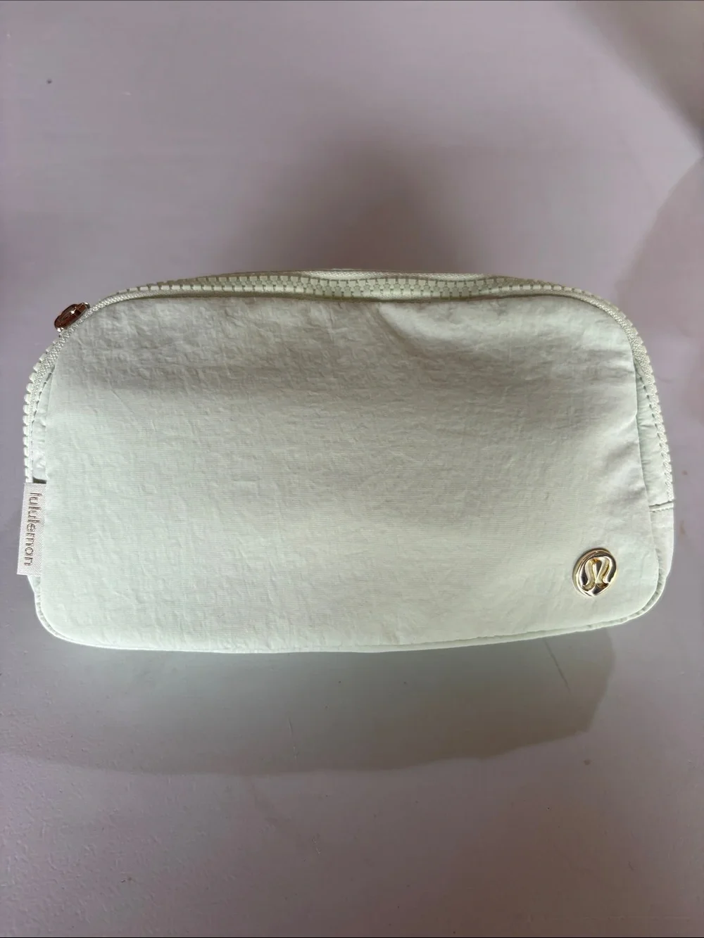 lululemon athletica Kohlrabi green belt bag with gold accents NWT